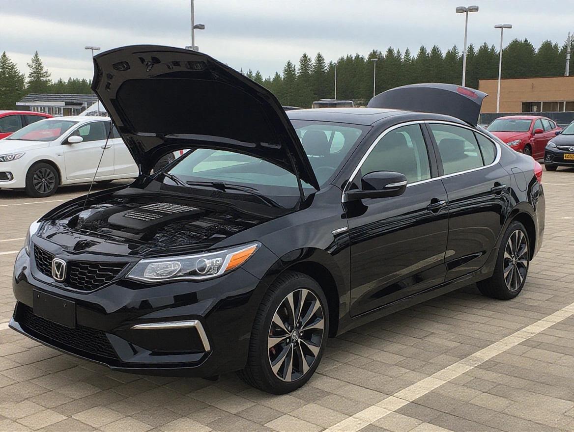 Black sedan parked with hood open. Natural lighting, showing details of the vehicle.