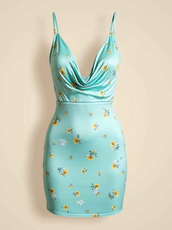 A fitted mini dress with a light blue base and floral print. The dress has yellow flowers and green leaves. The bodycon style hugs the figure. The length is mini, ending mid-thigh. It is sleeveless with spaghetti straps and has a deep V-neckline with a draped front. The floral pattern is vintage-inspired. The fabric is lightweight and smooth with a slight sheen. It is a casual yet elegant summer dress suitable for warm weather.