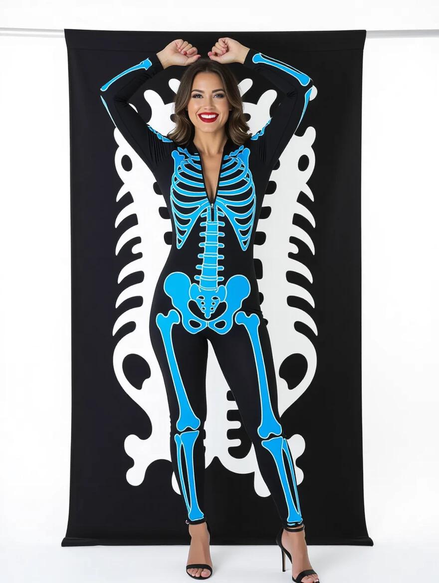 Photograph of a woman standing against a solid black background. Full-body bodysuit featuring a skeleton design in bright blue and white. Skeleton pattern includes ribcage, vertebrae, and limb bones. Smiling expression with red lipstick. Arms raised above head and hands clasped together. Legs slightly apart. Bodysuit has a zipper down the front. Woman poses confidently and playfully. Bright and even lighting highlights the outfit. Image quality is sharp and clean without watermarks. Bodysuit fits closely, accentuating curves. Skeleton design is bold and striking for Halloween or costume party. Cheerful expression and minimal makeup enhances playful mood.