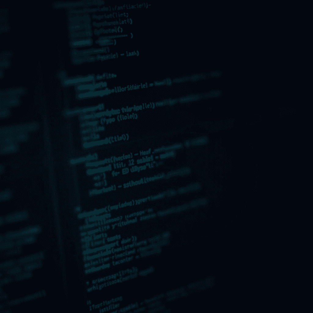 The image shows a close-up of a computer screen displaying lines of code, featuring syntax highlighting with green and blue text on a dark background.