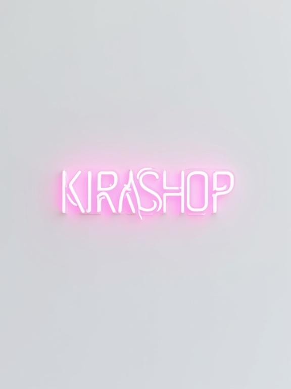 Minimalist image of text 'KIRASHOP' in neon pink. Text placed on pure white background. Focus on modern typography and clean design. No additional elements or textures.