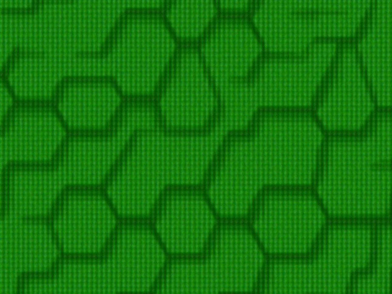 The image shows a collection of green, hexagonal shapes stacked in multiple layers. Each hexagon is slightly elevated from the one beneath, creating a textured, three-dimensional effect. The overall appearance is reminiscent of a tessellated pattern found in nature, such as a honeycomb or hexagonal basalt columns. The lighting accentuates the depth and contours of the shapes, casting soft shadows that enhance the visual complexity. This geometric arrangement is pleasingly abstract and can evoke thoughts of natural formations or mathematical precision.