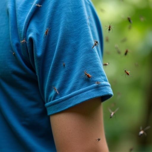 Close-up view of a human arm with blue T-shirt. Tropical forest background. Swarm of mosquitoes around blue fabric. Soft natural lighting highlights details. Macro lens captures mosquito wings.