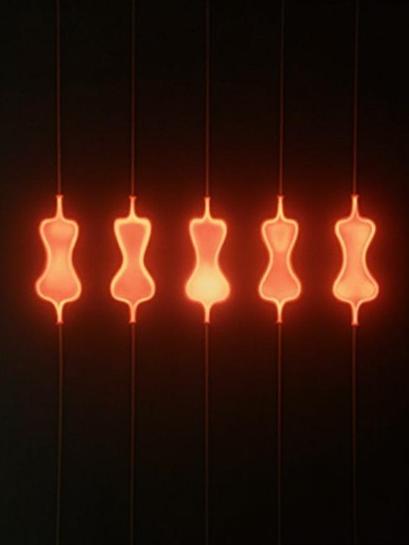 Series of glowing erotic shapes arranged in a line. Classic 1940s isotype infographic aesthetic is invoked.