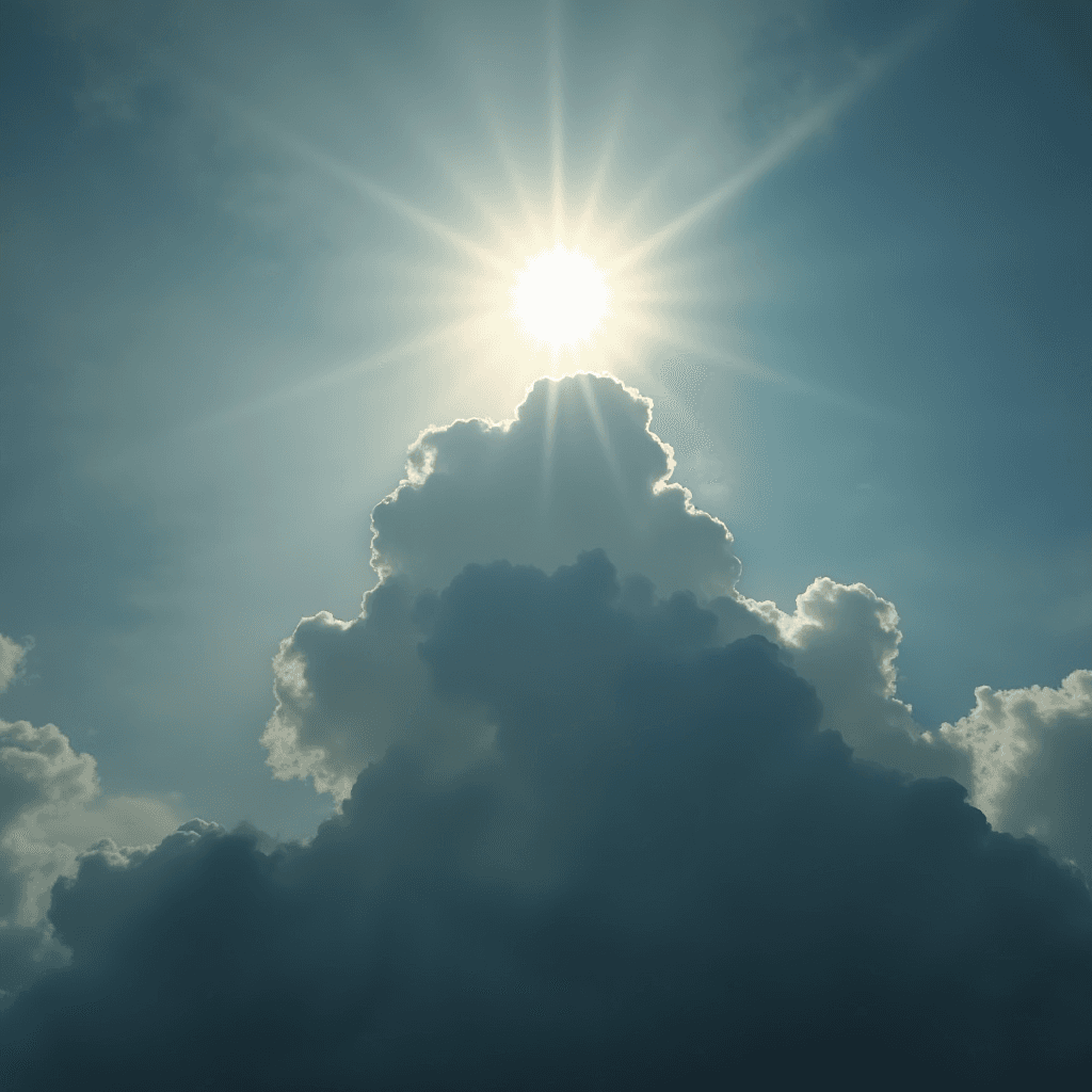 The sun shines brightly behind towering, fluffy clouds in a clear sky.