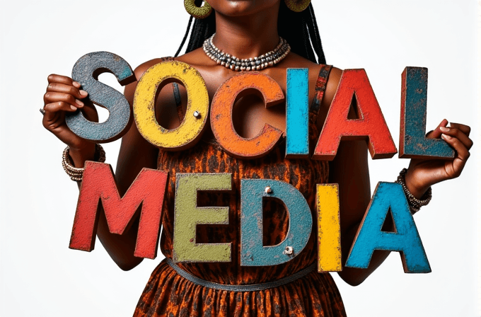 A person holds colorful letters spelling 'SOCIAL MEDIA' against a plain background.