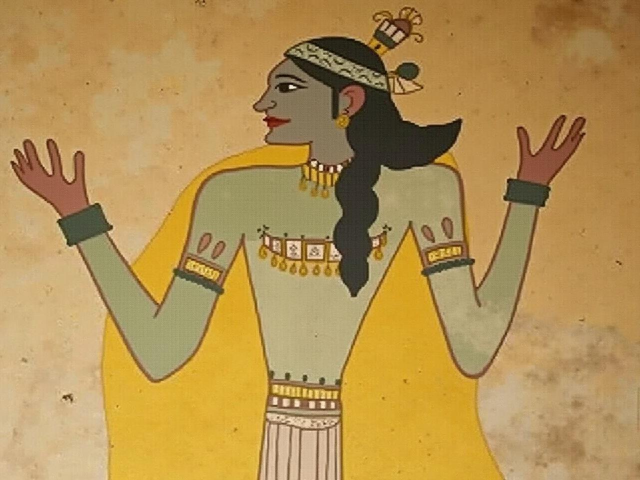 The image shows a historical mural or artwork featuring a figure with a stylized design. The figure appears to be adorned with intricate jewelry and a decorative headpiece. They are holding something in one hand and showcasing a hand gesture with the other. The painting features vibrant colors, especially yellows and greens. The background seems to be a textured wall, which adds to the ancient feel of the artwork. The absence of facial details suggests it may be symbolic or a representation rather than a realistic portrait.