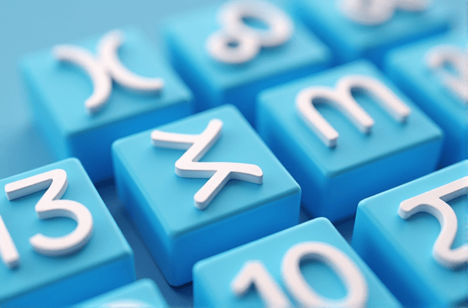 The image features a close-up of blue keys with white zodiac symbols on them.