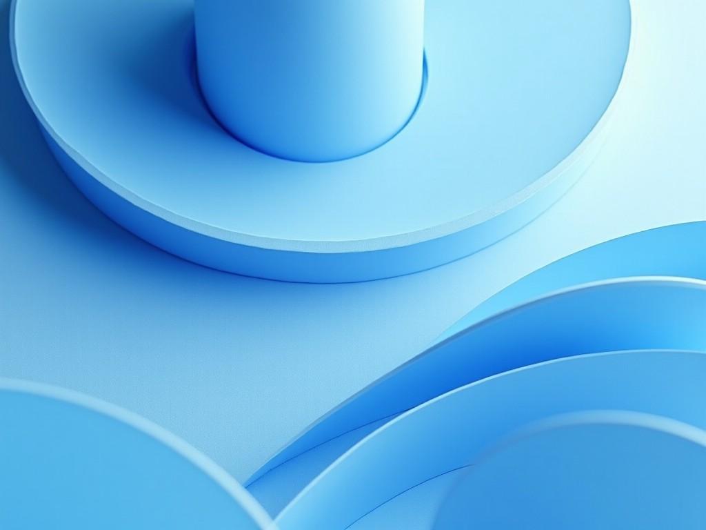 The image features an abstract composition primarily in shades of blue. There are circular and cylindrical shapes arranged in a smooth, flowing manner. Soft lighting gives the scene a serene and modern feel. The layers and curves create depth, inviting the viewer to explore the geometric forms. This minimalistic design is suited for various creative projects.