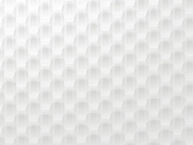 Abstract geometric pattern of repeating hexagons. Seamless three-dimensional grid of light gray and white hexagons. Slightly raised and recessed texture creating visual depth. Hexagons tightly packed forming minimalist design. Shades of gray and white enhancing geometric precision. Composition is symmetrical and balanced. Modern clean design with neutral color palette.