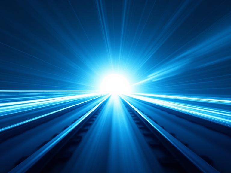 Abstract image featuring vibrant blue hues and white light. Motion lines radiate from the source of light symbolizing speed. Represents a rail tunnel extending into the distance with a cityscape hint.