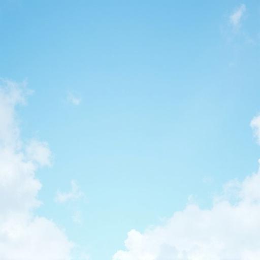 Bright blue sky with scattered fluffy white clouds in spring season. View from below looking upward. Partly cloudy sky with soft colors.