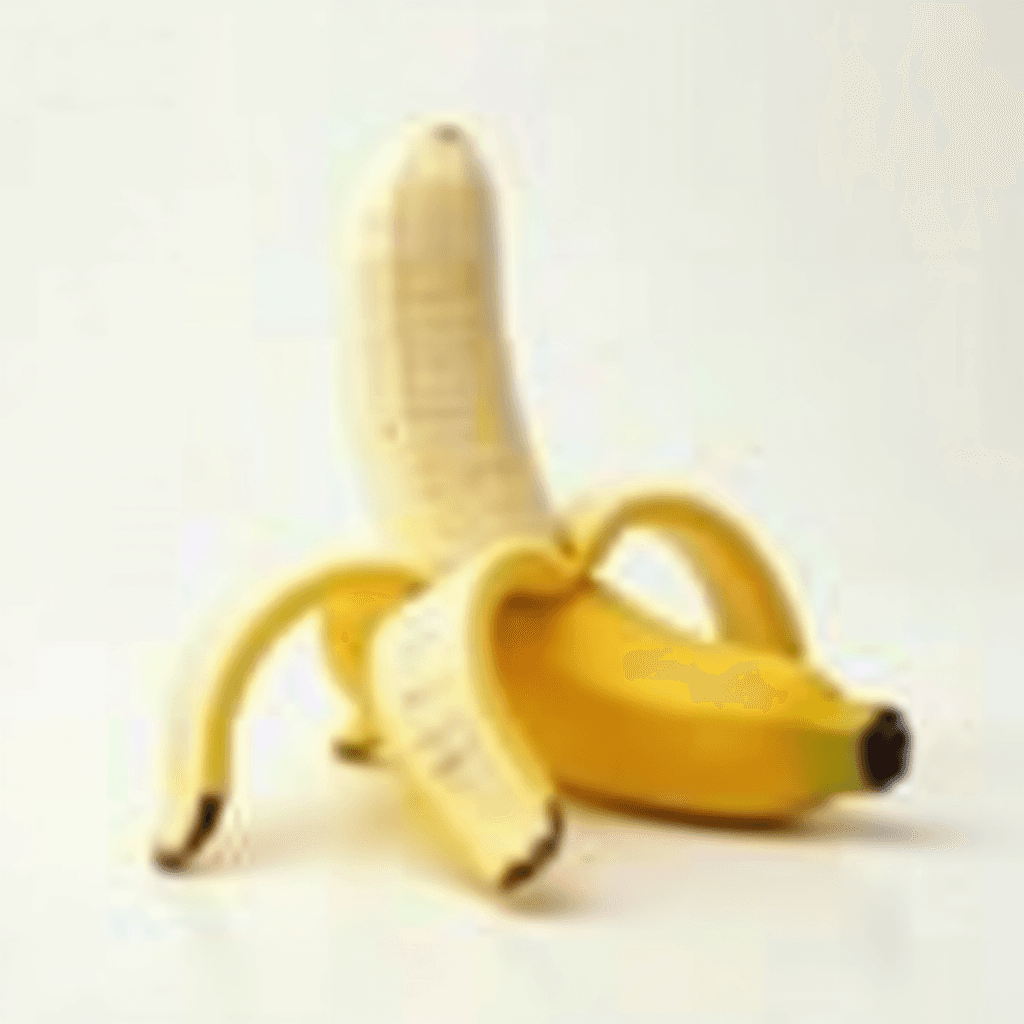 A banana partially peeled, revealing the fruit inside.